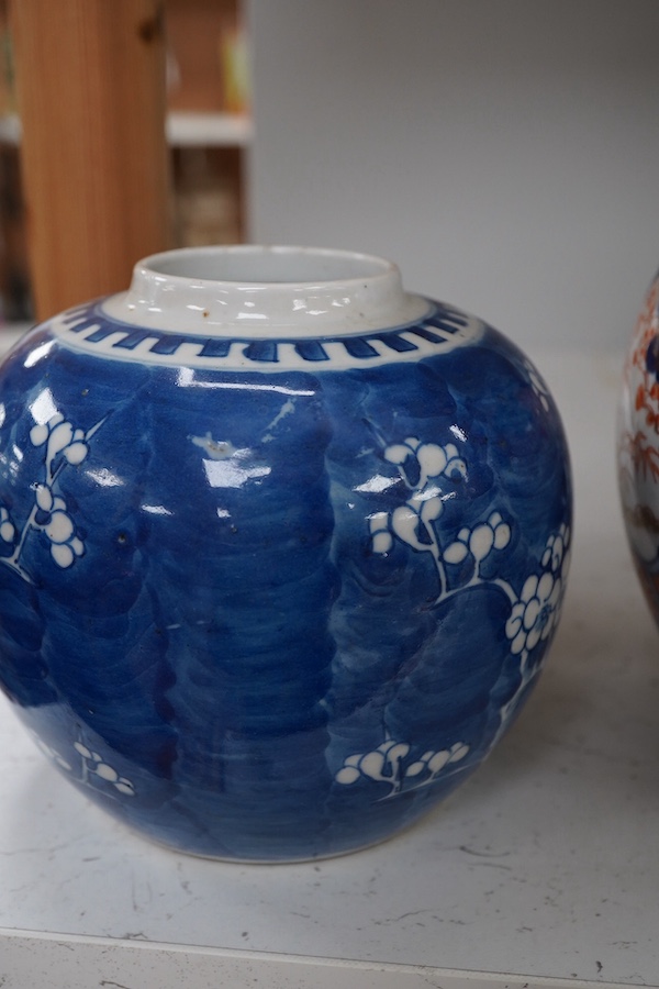 A Japanese Imari double gourd vase and a Chinese blue and white prunus jar. 34cm. Condition - good